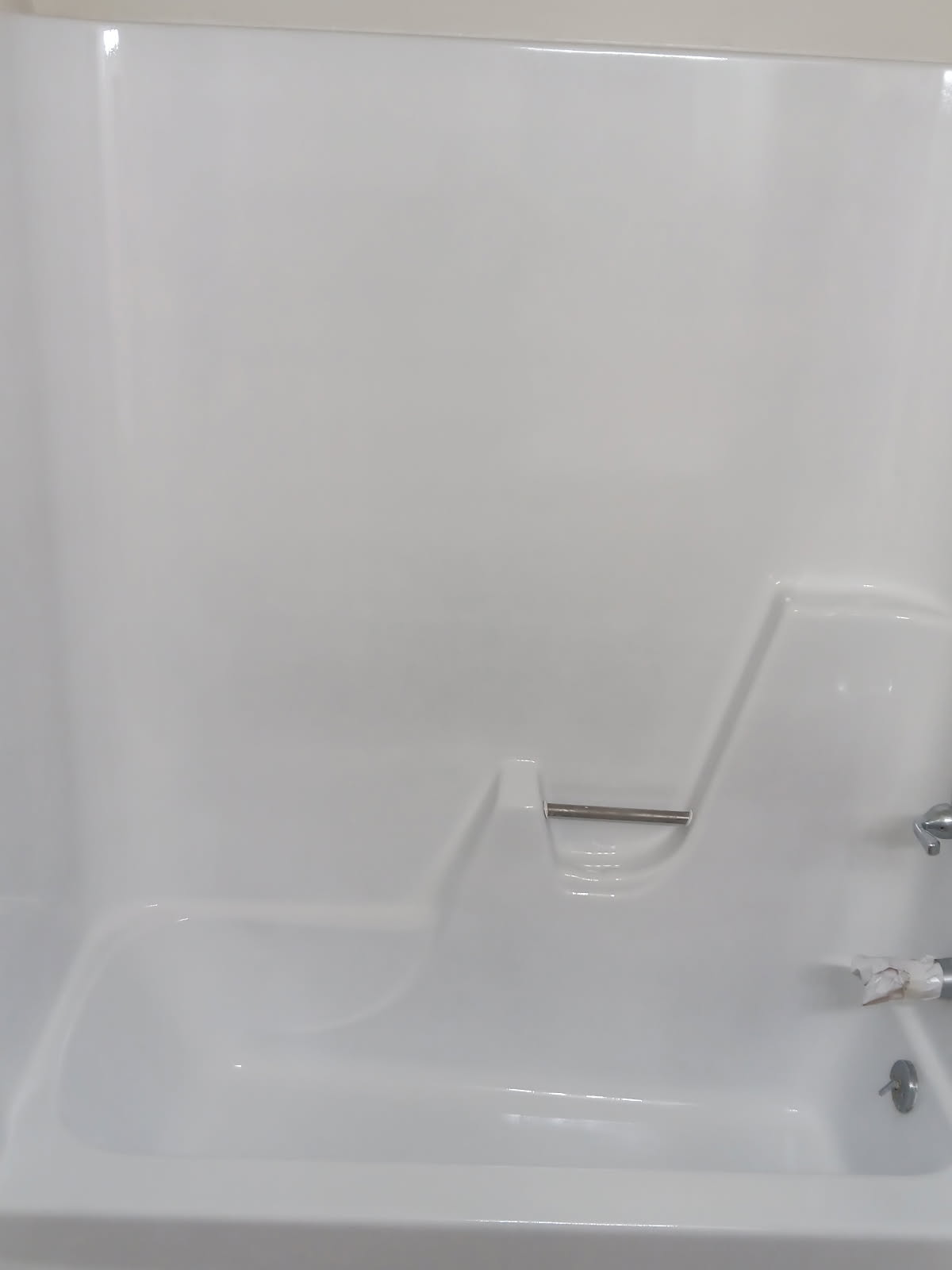 Bright white shower stall after refinishing